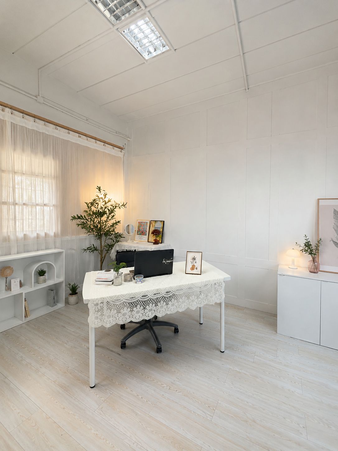 COCUT Studio interior - minimalist white desk room
